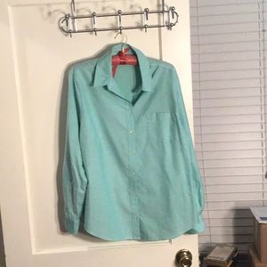 Long sleeved button down top.